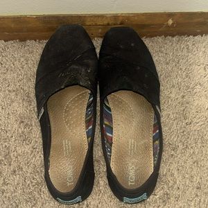 Black slip on Tom’s